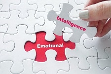 Puzzle pieces with "emotional" and "intelligence" written on them.